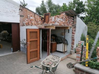 afbraak en heropbouw van bijgebouw