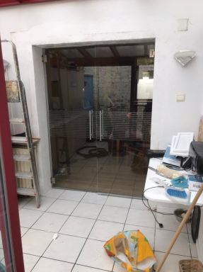 Accordeondeur vervangen door  glazen dubbele deur in Wachtebeke